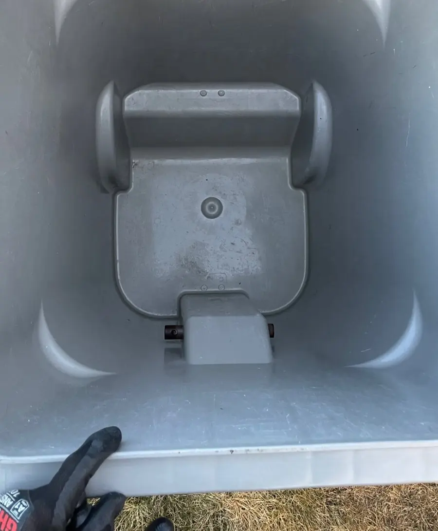 Inside of the same bin after cleaning, spotless and bright