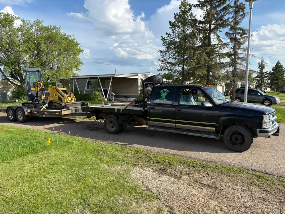 Bin Buddy truck hauling lawn equipment